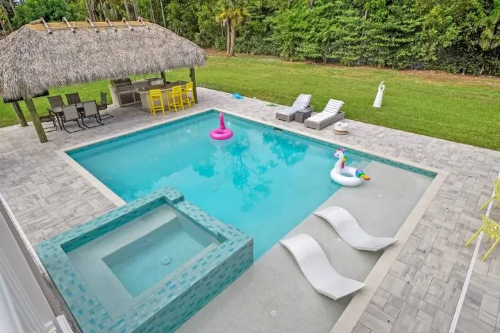 Saltwater pool with spa and in-water loungers